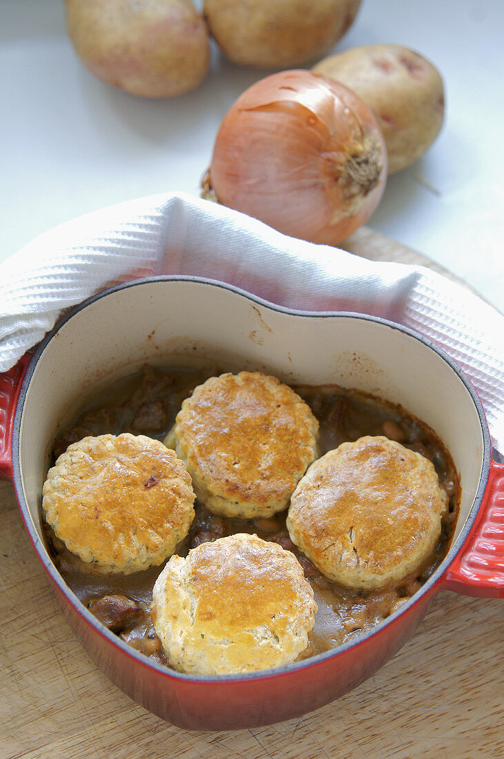 Lamb cobbler (lamb ragout with scone topping) in casserole