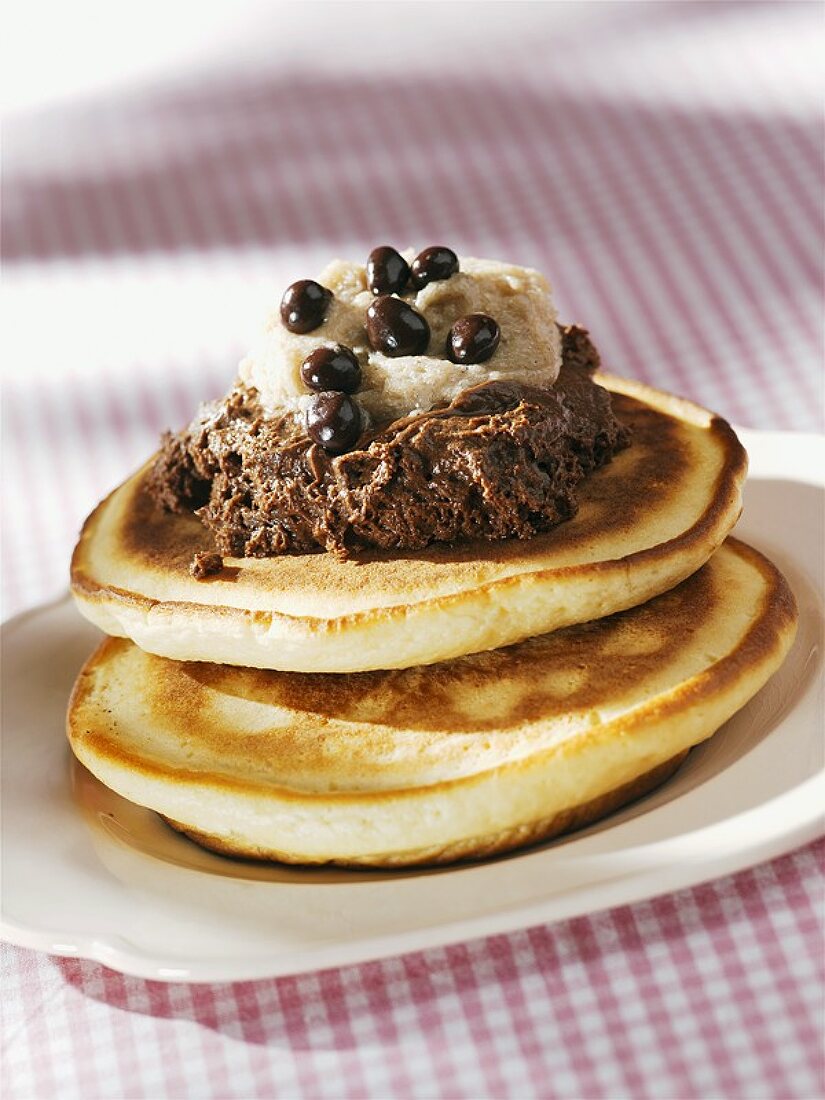 Two pancakes with chocolate cream