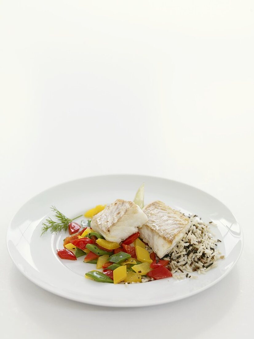 Cod on rice and peppers