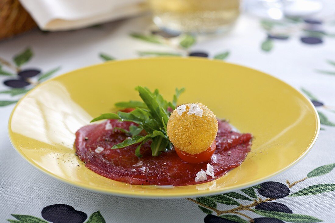 Beef carpaccio with fried buffalo mozzarella