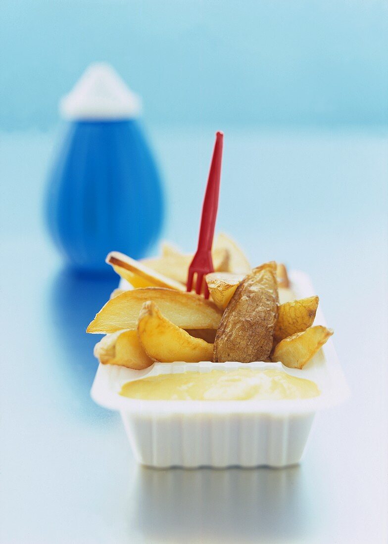 French Fries in Take Out Container with Plastic Fork