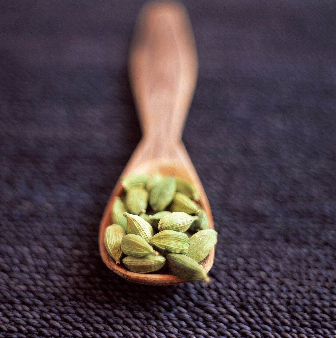 Cardamom on a Wooden Spoon