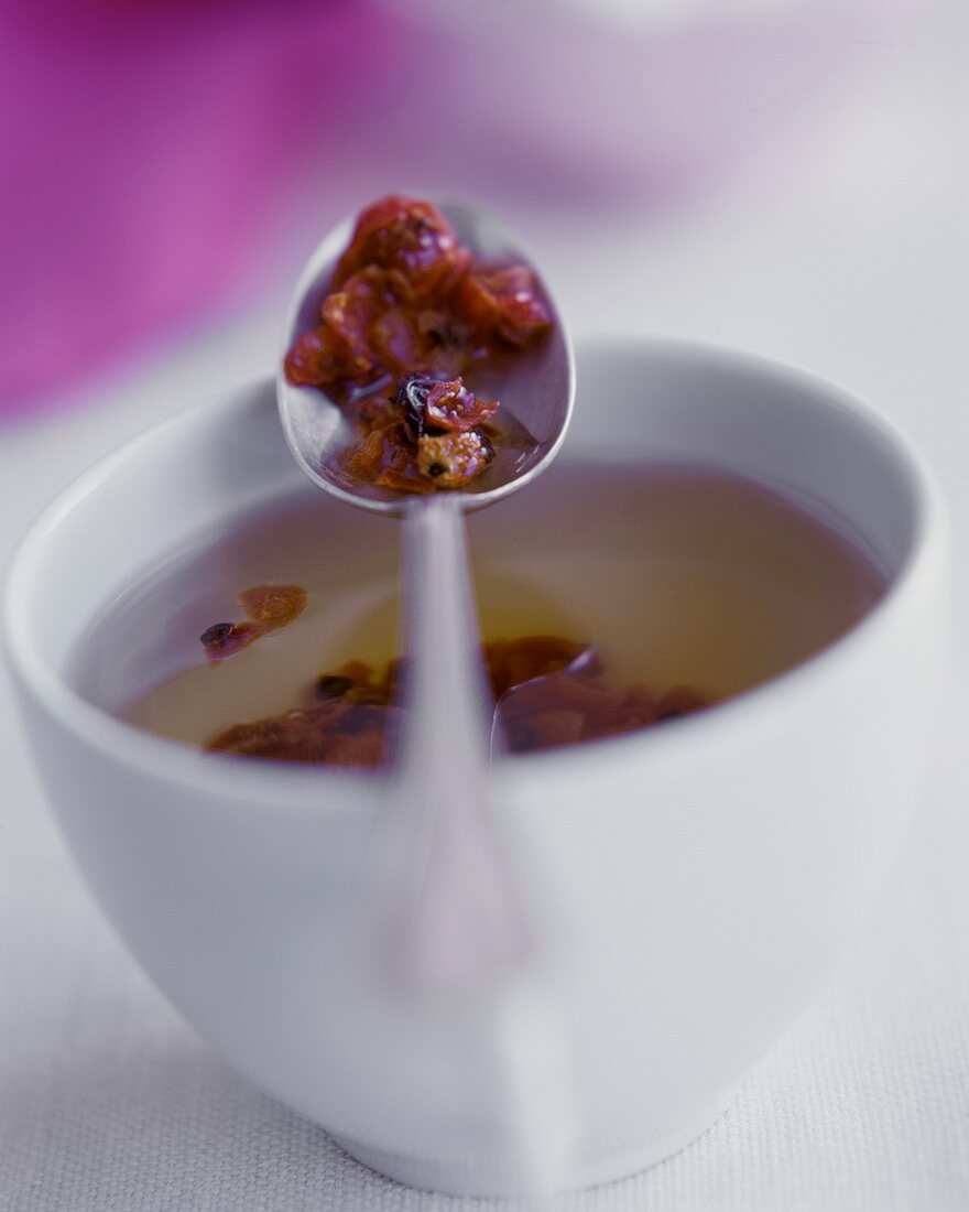 Rose Hip Tea in Cup and on Spoon
