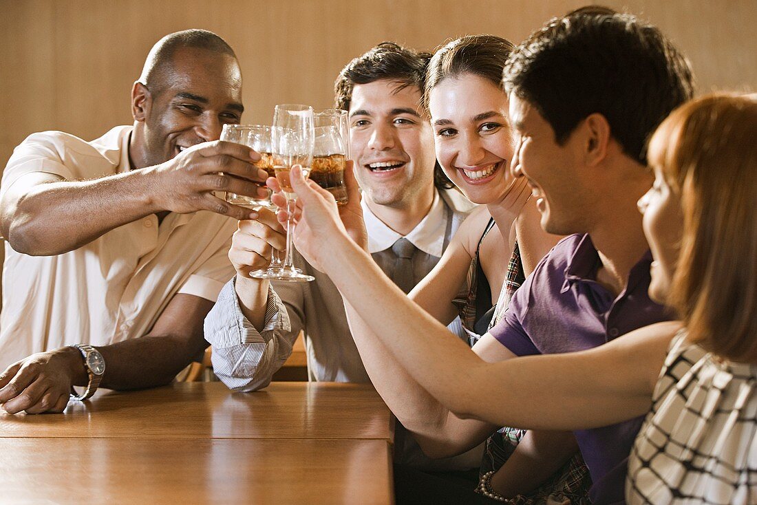 Friends celebrating in a bar