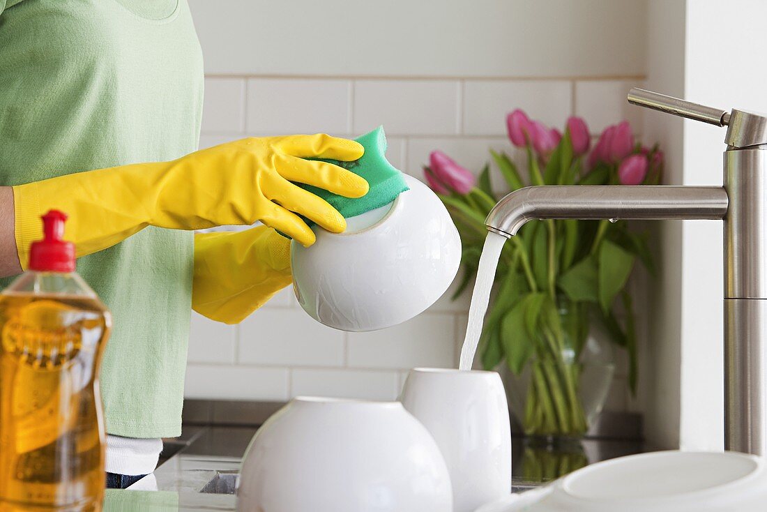 A woman washing up