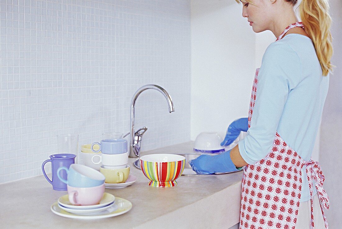 A woman washing up