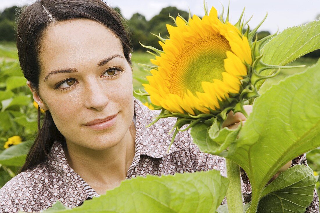 A woman with a sunflower