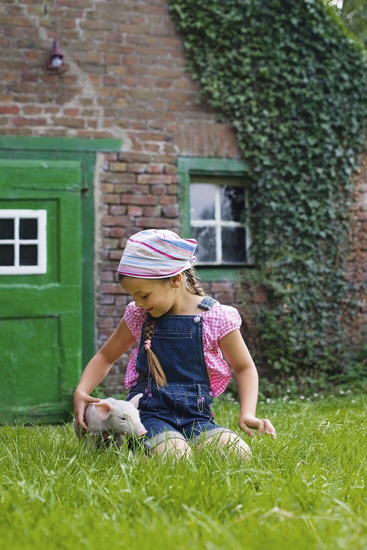 A girl and a piglet