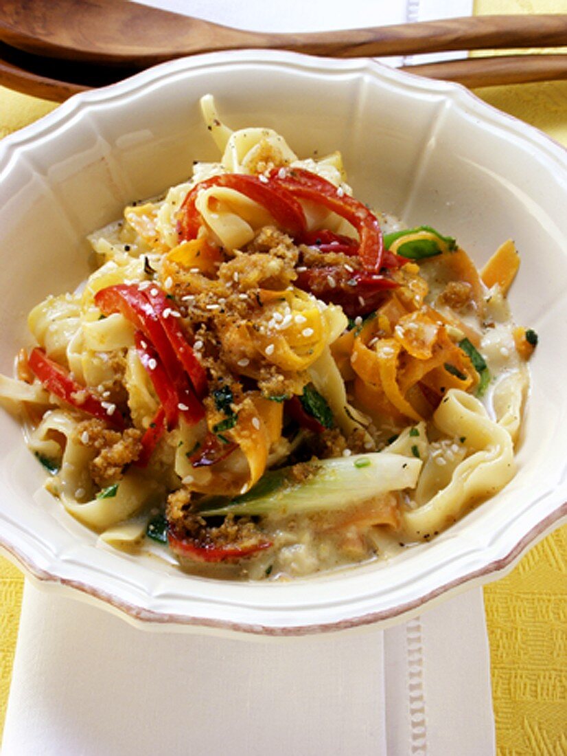 Ribbon noodles with vegetables and sesame