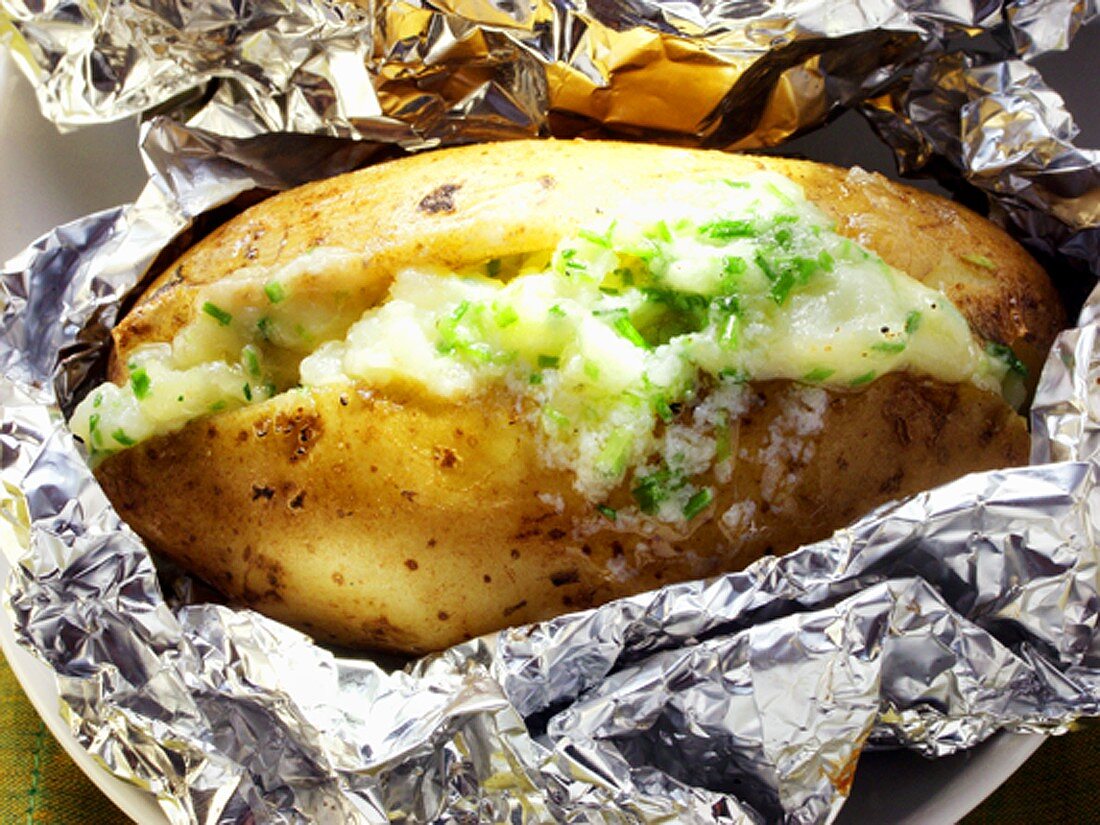 Baked potato with herb cream cheese