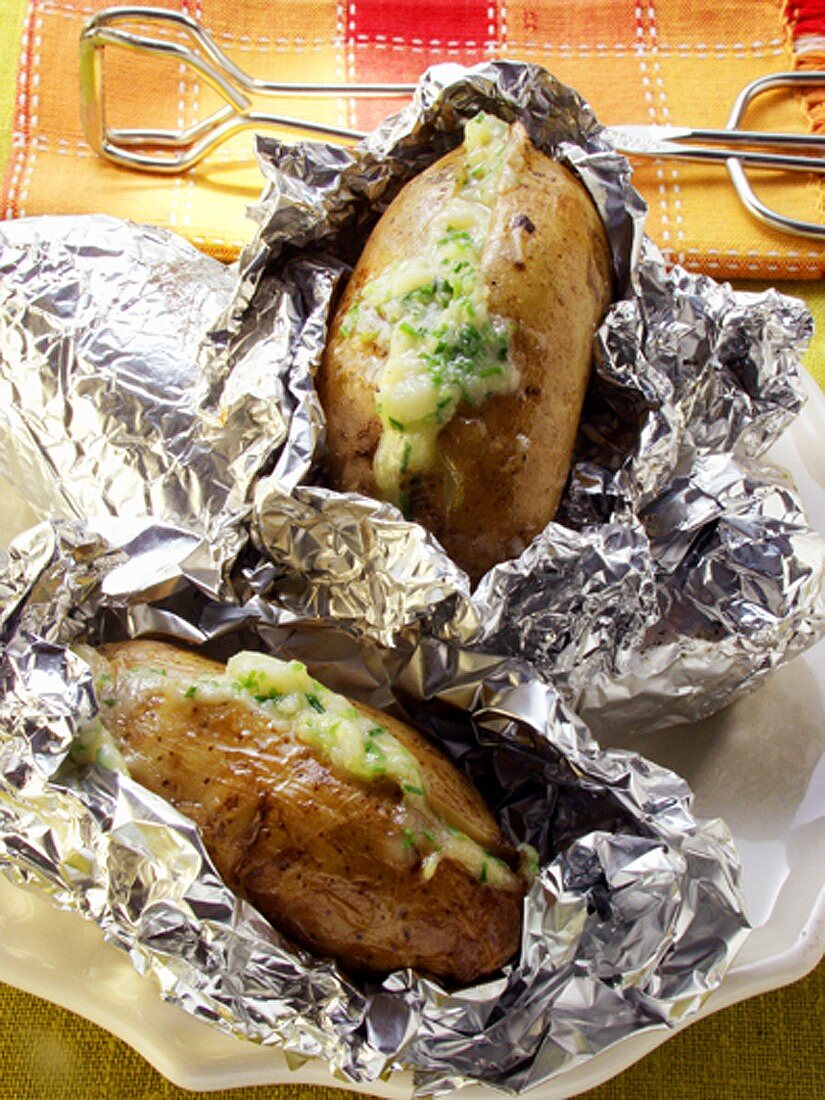 Baked potatoes with herb cream cheese