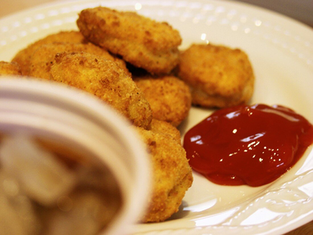 Chicken nuggets with ketchup