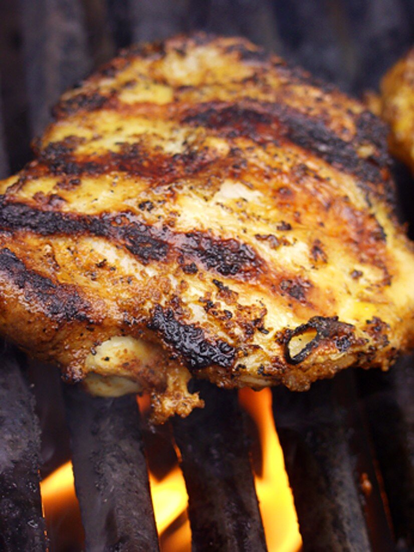 Barbecued chicken breast with bones