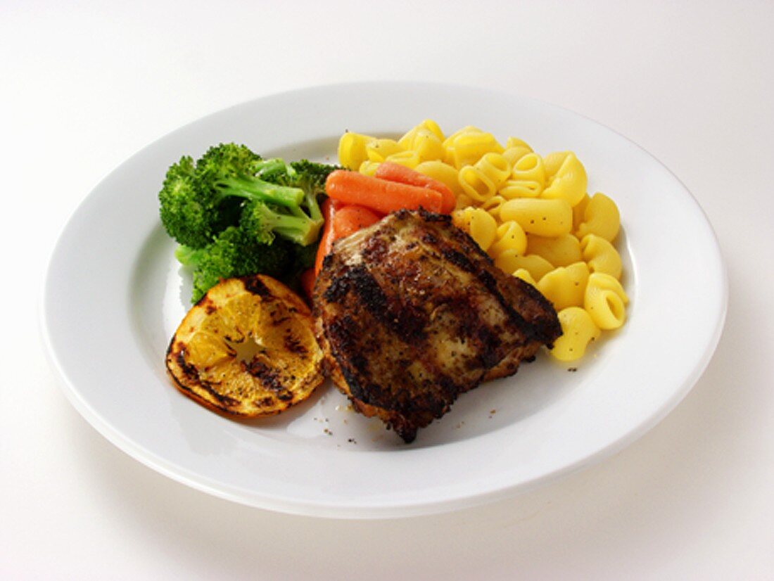 Barbecued chicken breast with noodles and vegetables