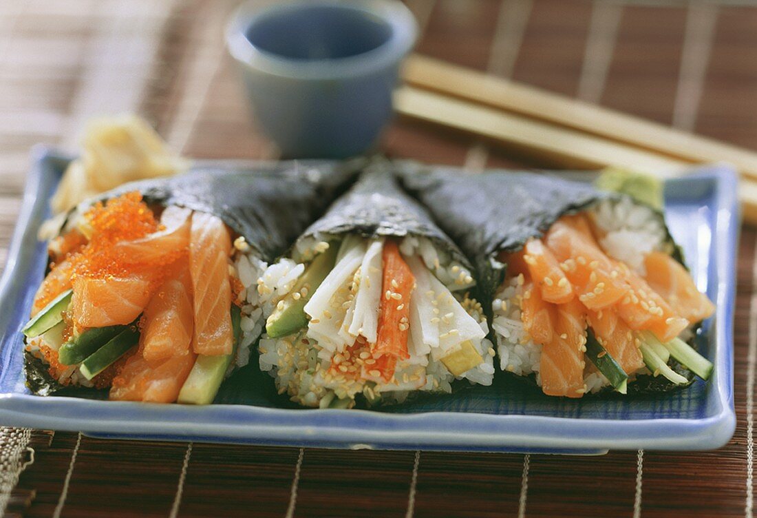 Temaki sushi with salmon and crabmeat
