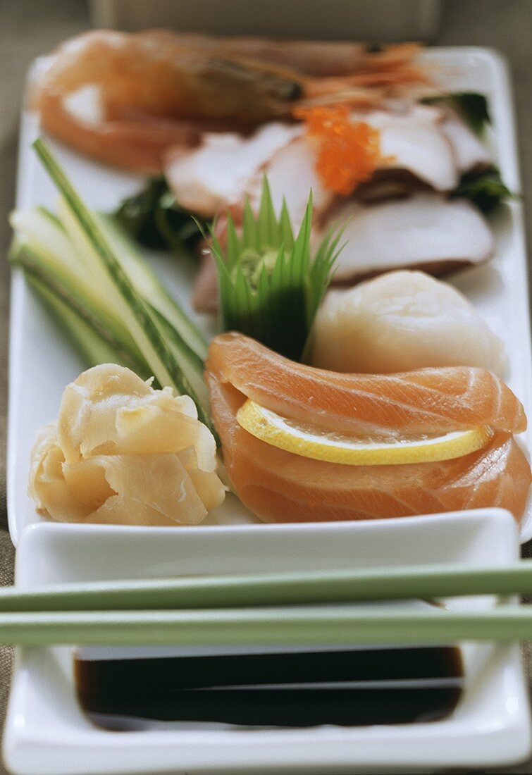 Sashimi with salmon, ginger and soy sauce