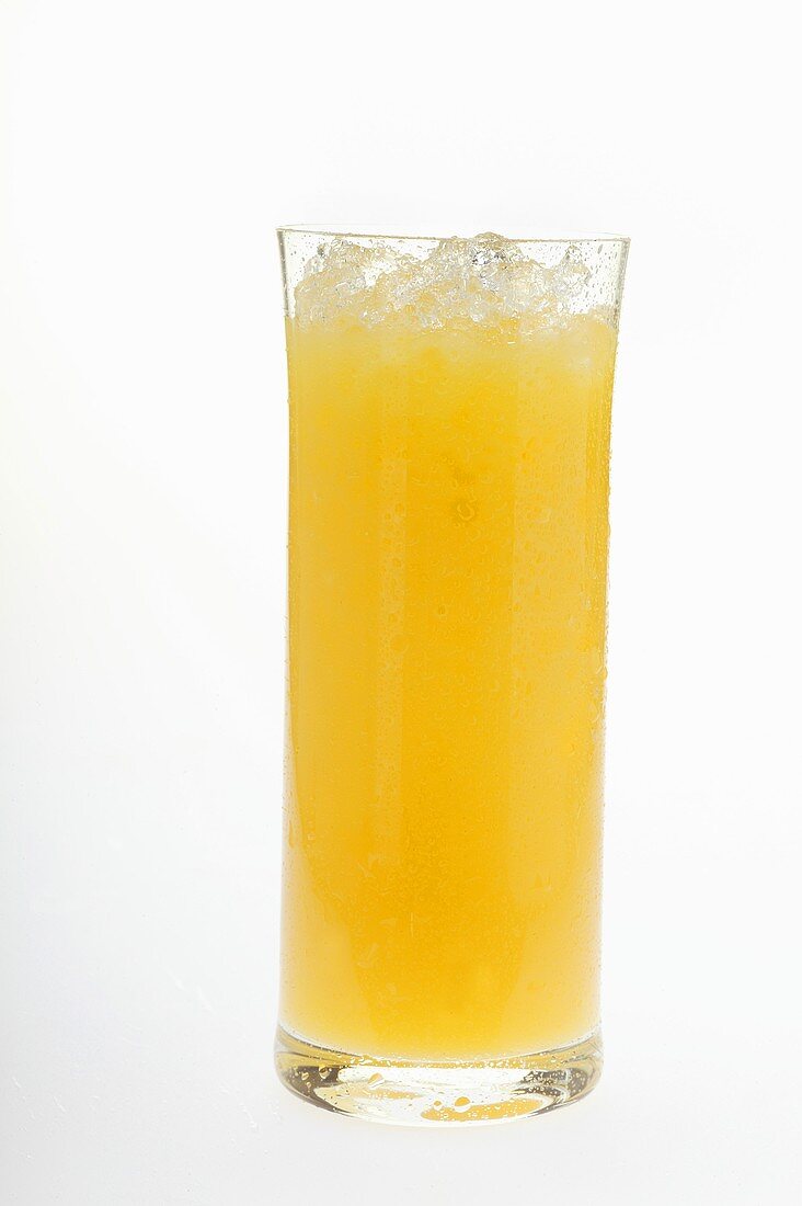Orange juice in glass with crushed ice