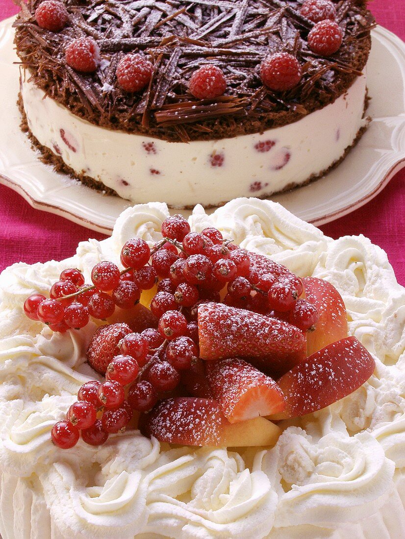 Chocolate raspberry gateau and cream cake with berries