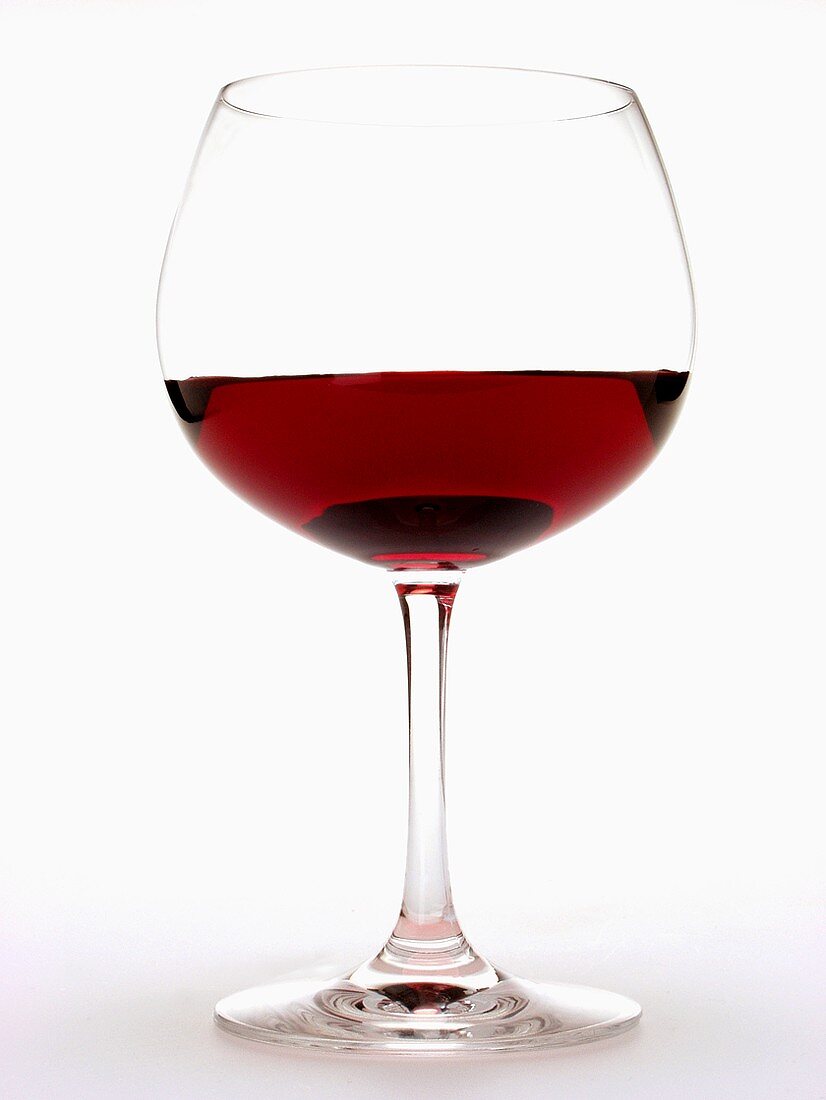 Red wine glass, half filled