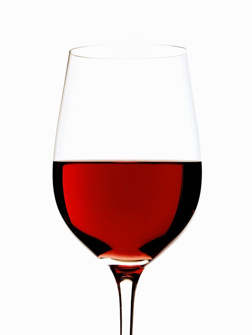 Red wine glass, half filled