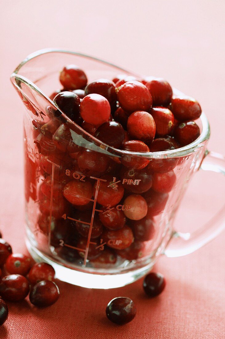 Cranberries in measuring jug