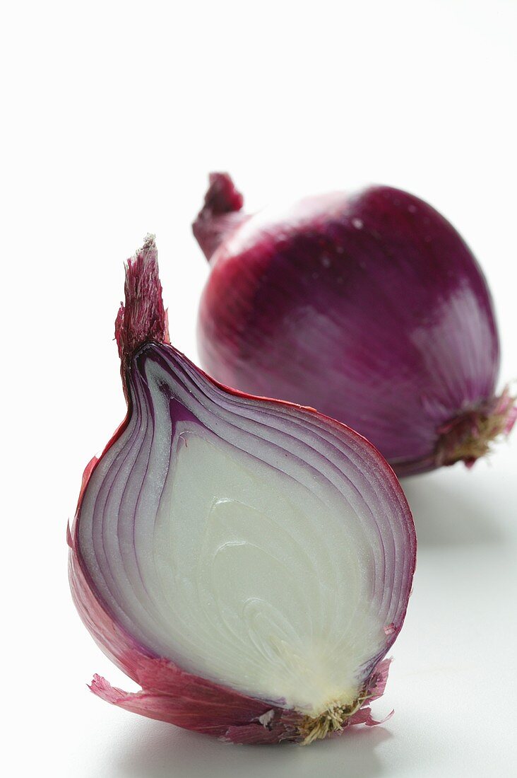 Whole and half red onion