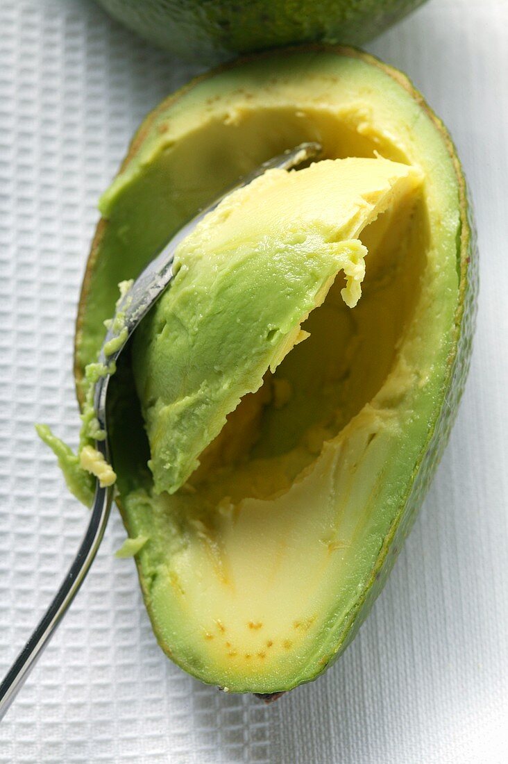 Hollowing out an avocado