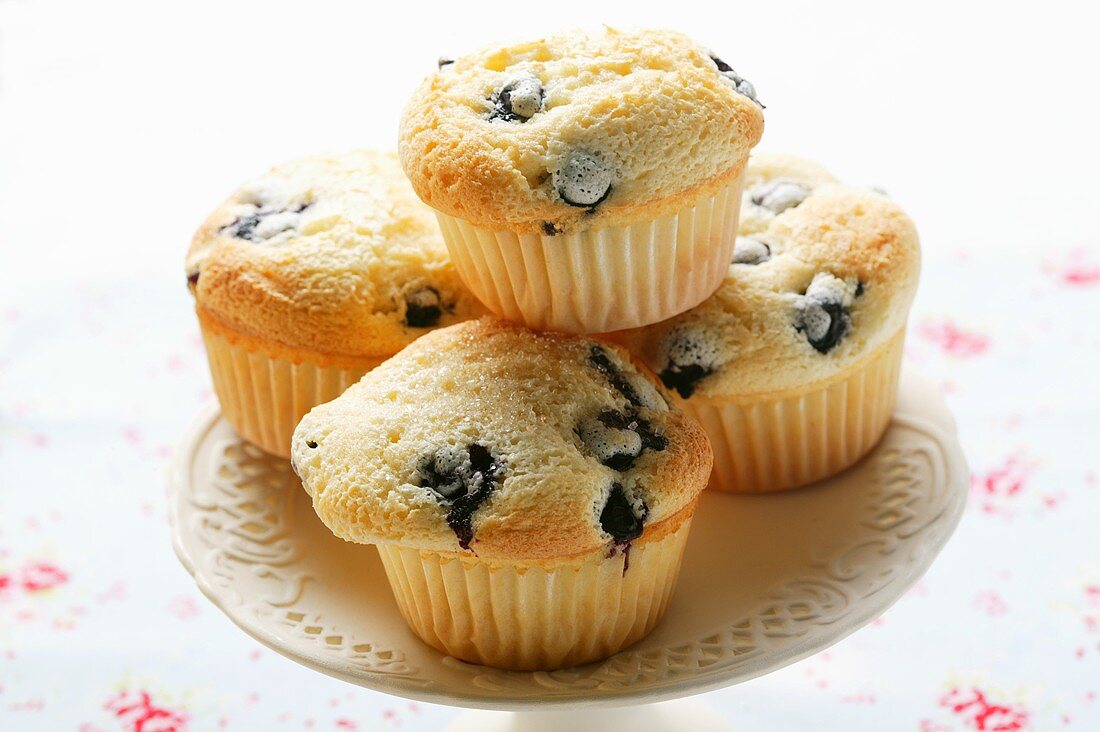 Blueberry muffins on cake plate