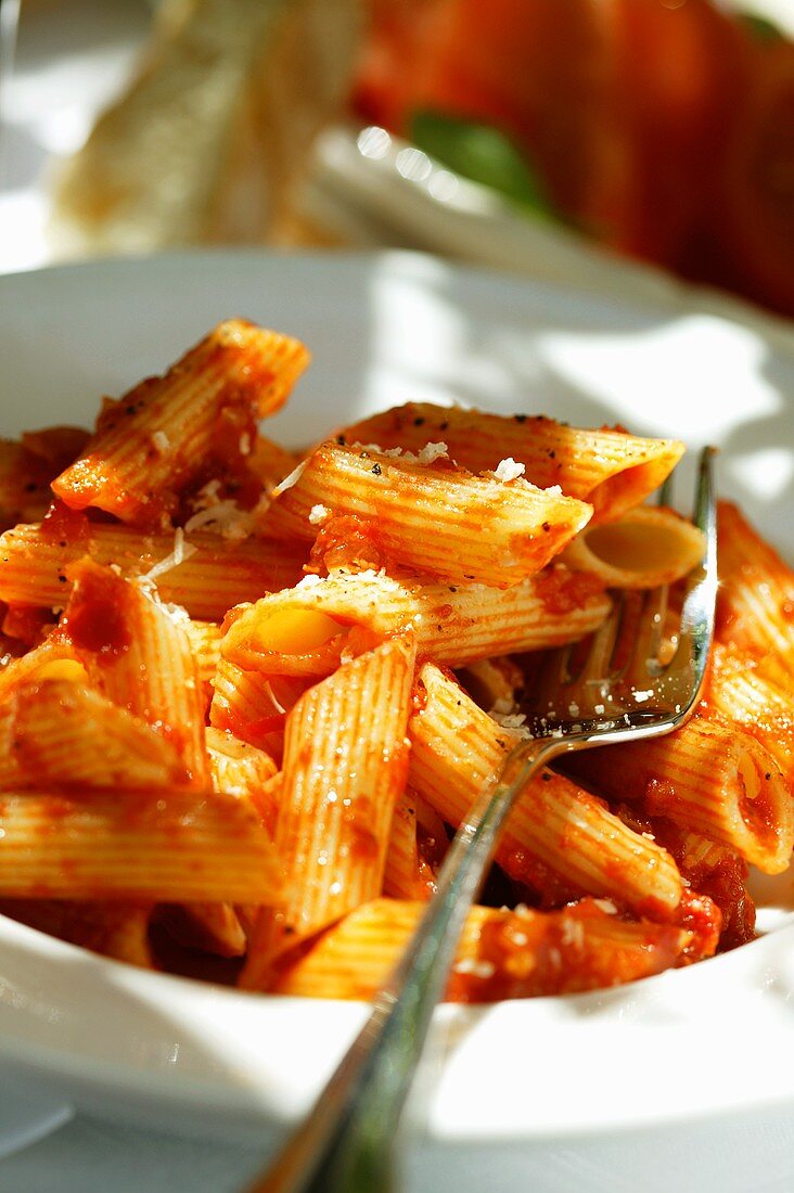 Penne rigate with tomato sauce and Parmesan