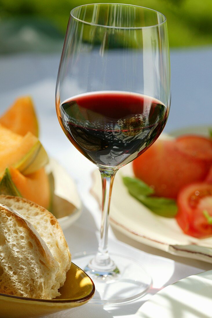 Glass of red wine on Mediterranean table