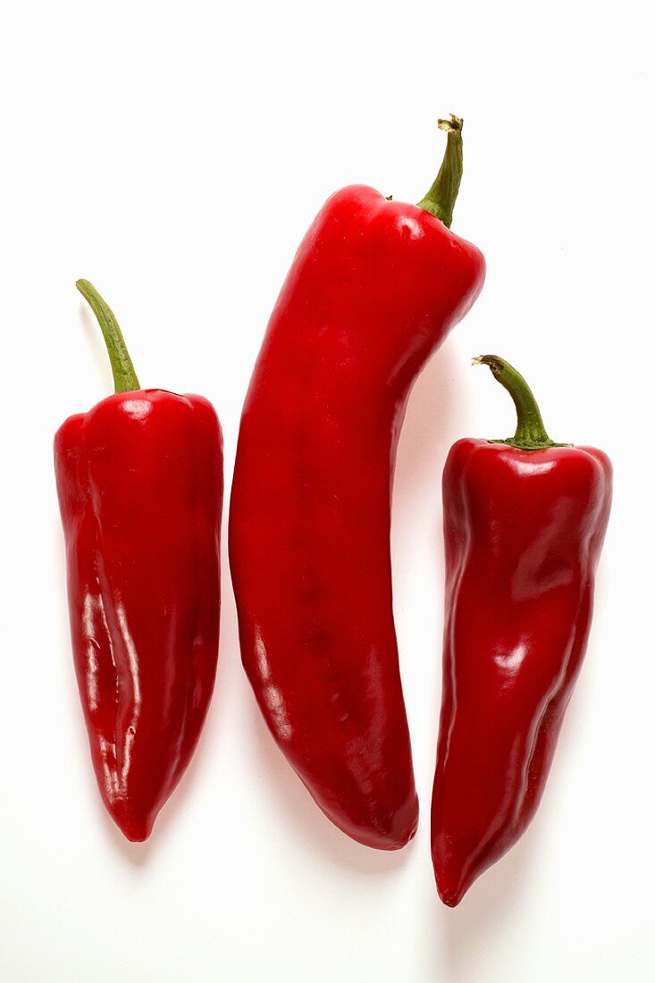 Three red chili peppers