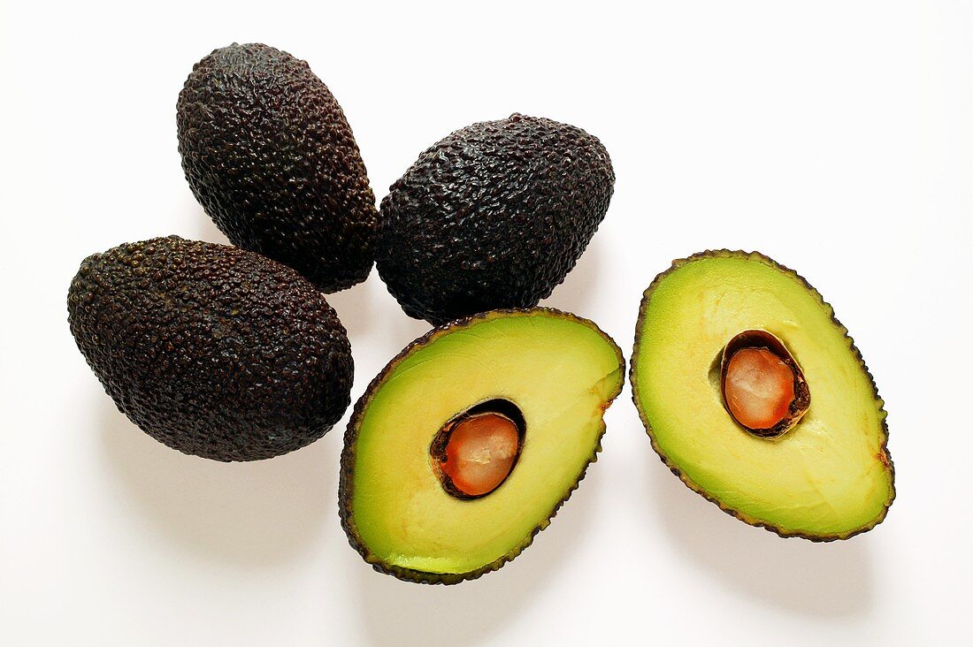 Mini-avocados, whole and halved