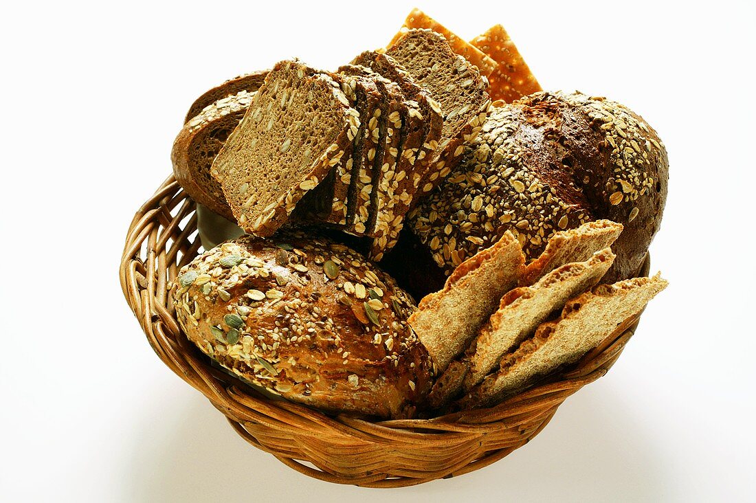 Various types of wholemeal bread & crispbread in bread basket