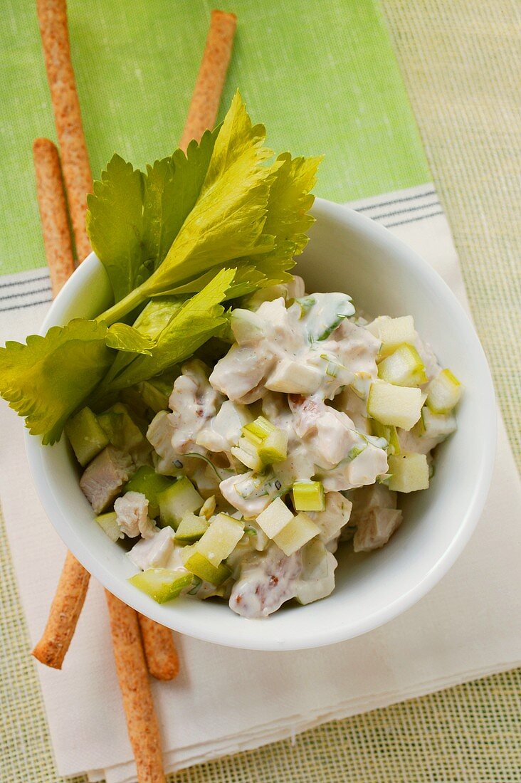 Chicken salad with celery; grissini