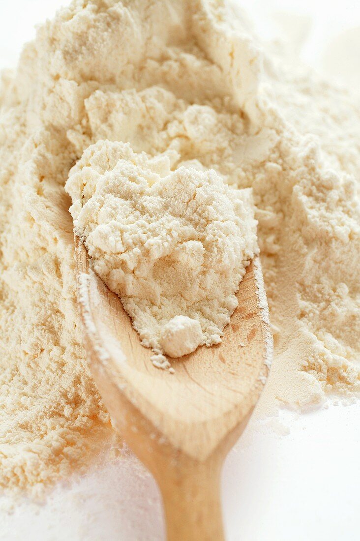Flour with wooden scoop