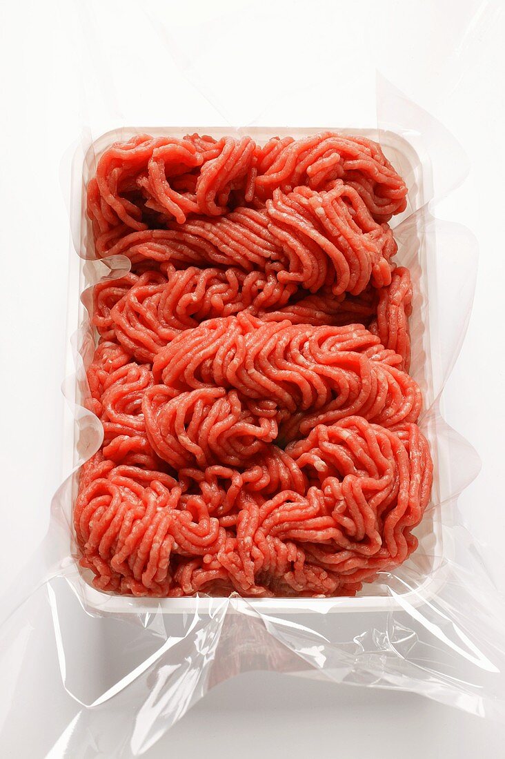 Fresh minced beef in plastic container