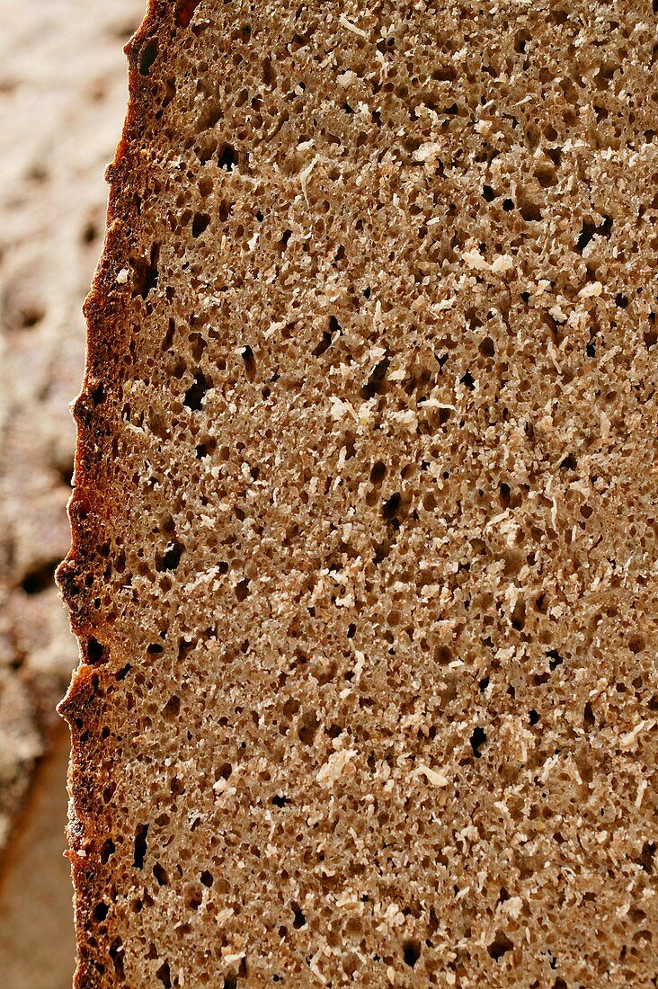 Farmhouse bread, slices cut (detail)