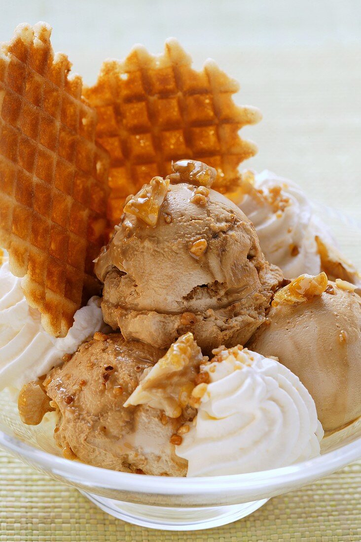 Walnut ice cream with caramelised nuts, cream & wafers