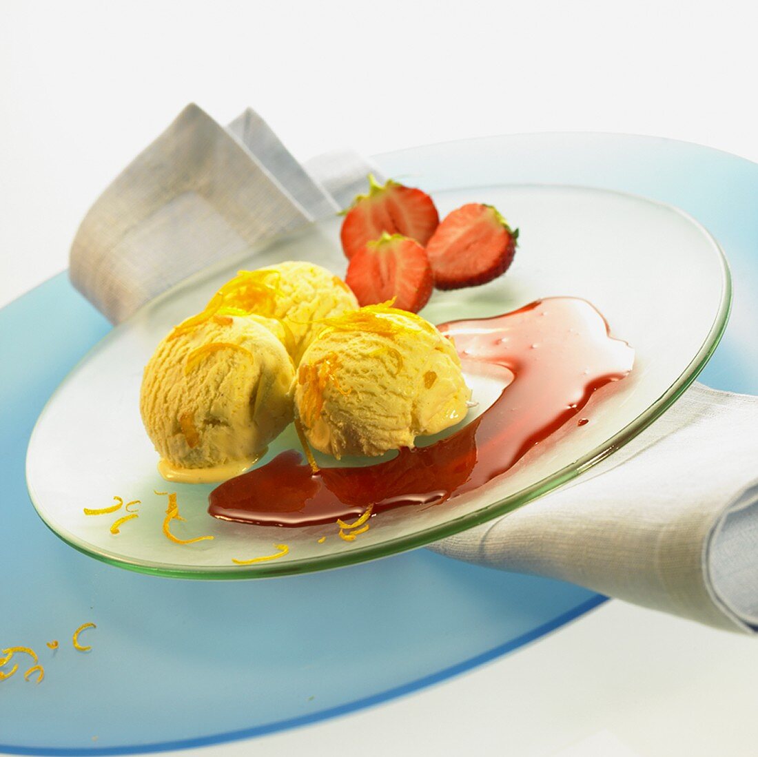 Vanilla ice cream with strawberry sauce