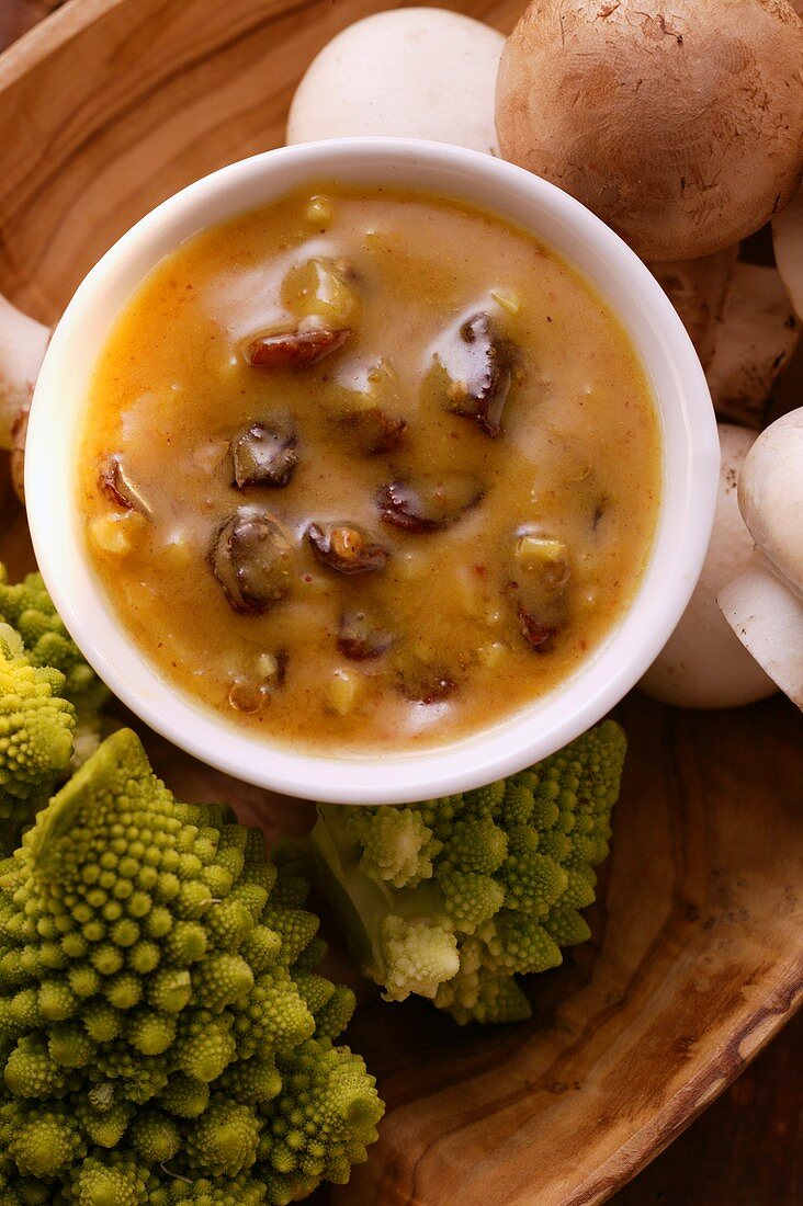 Peanut and raisin dip, romanesco and mushrooms