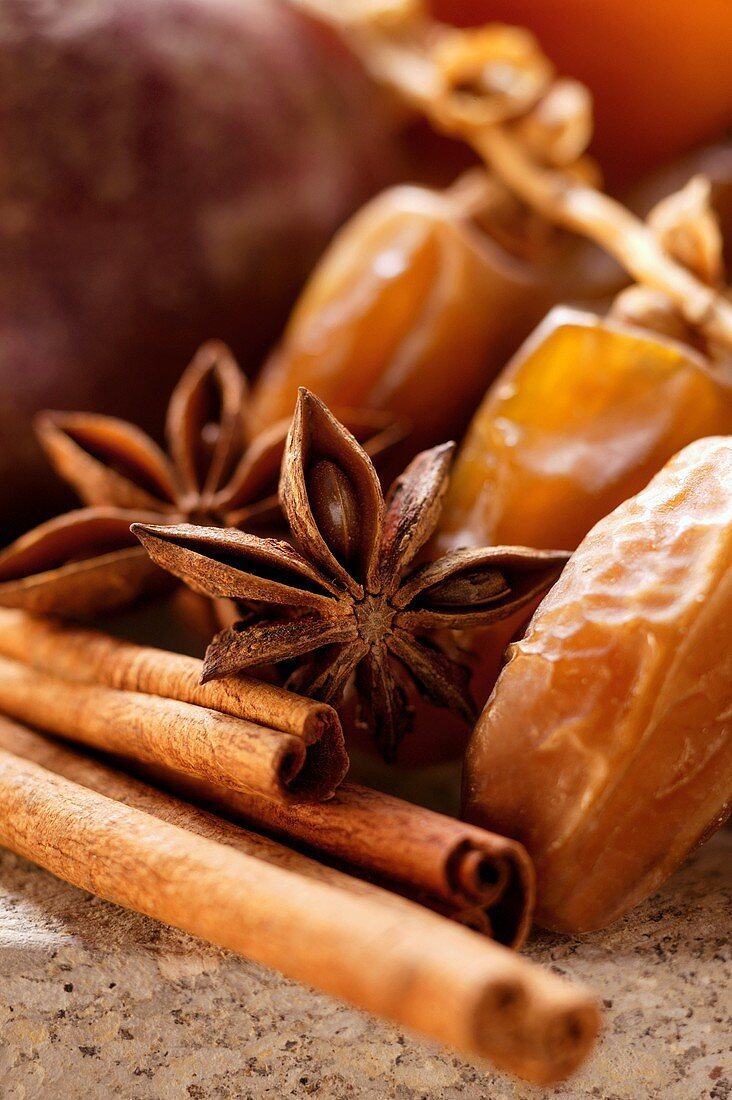 Still life with dates, star anise and cinnamon sticks