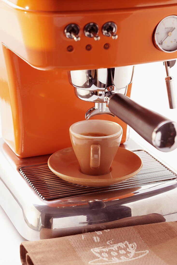 Cup of espresso on espresso machine