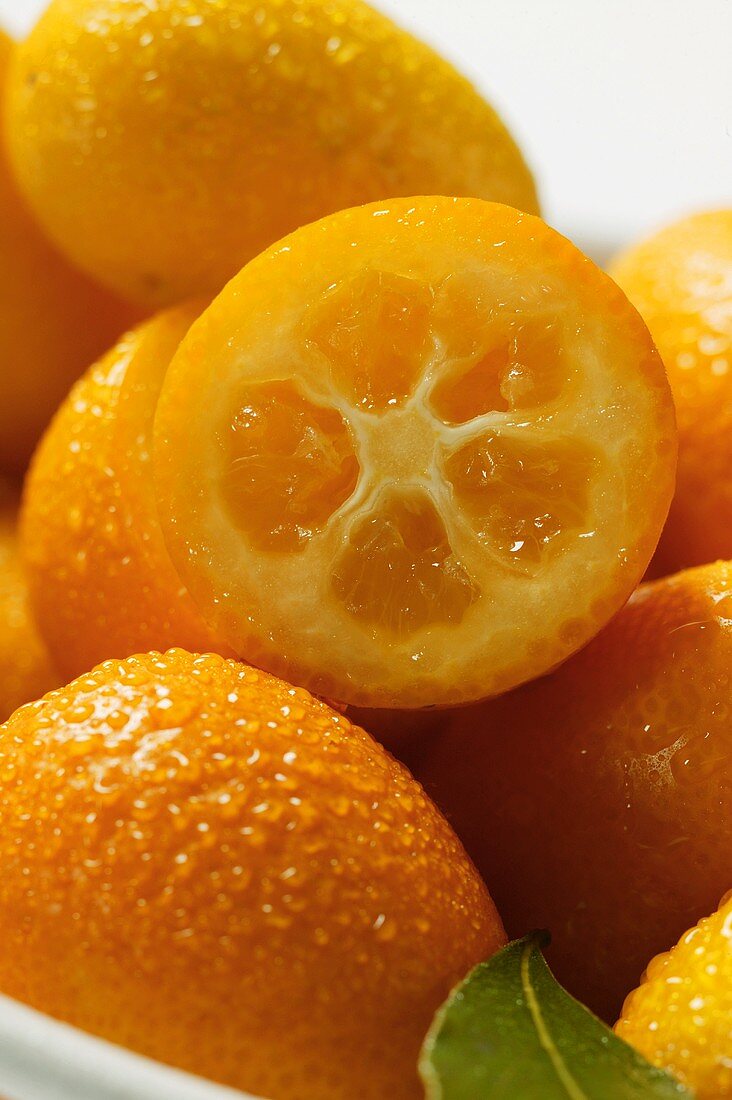 Kumquats with drops of water