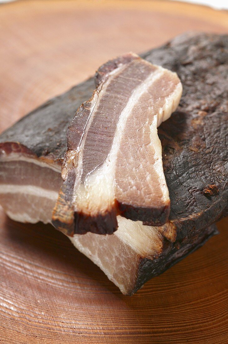 Organic bacon, slices cut, with slice of bacon