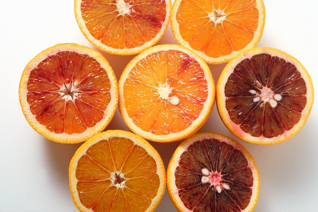 Several blood orange halves (overhead view)