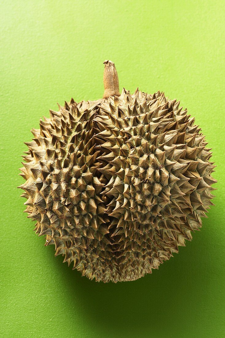 Durian on green background