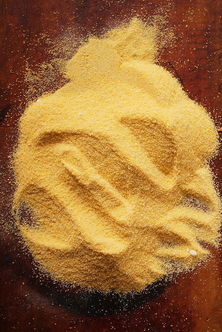 Polenta on wooden background