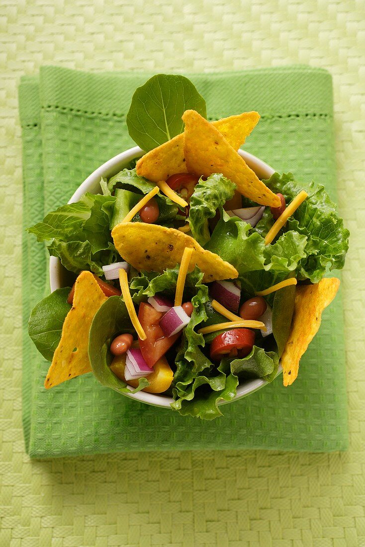 Mexican salad with vegetables and taco chips