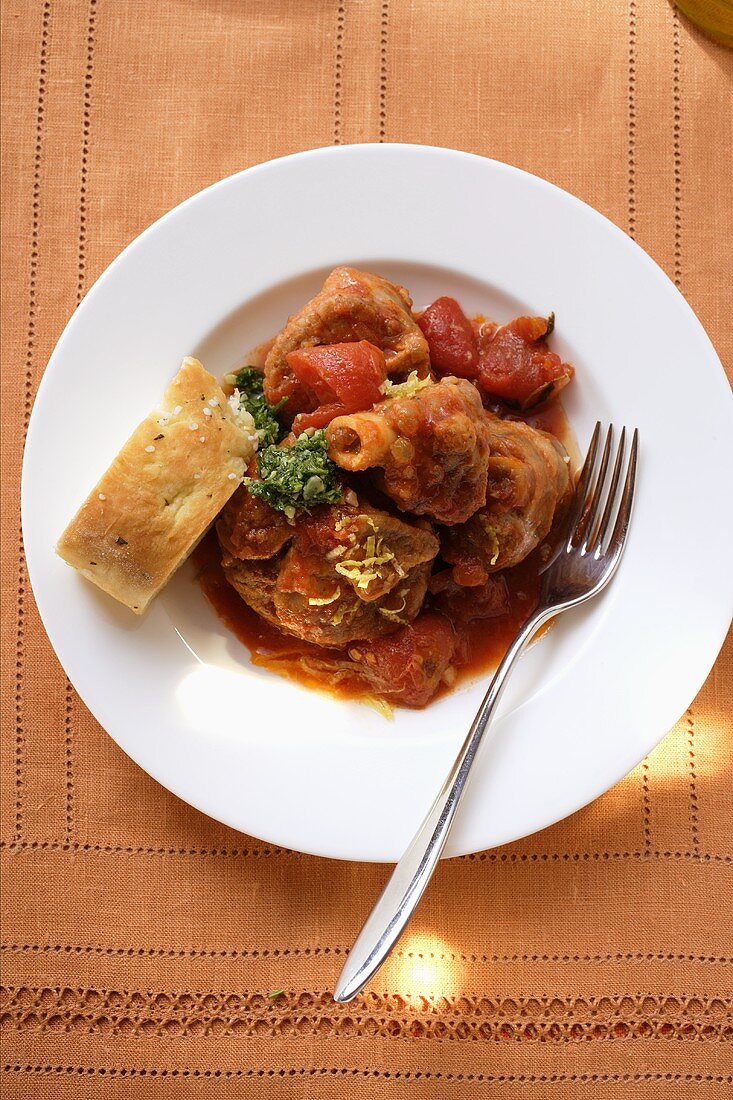 Osso buco with tomatoes and focaccia