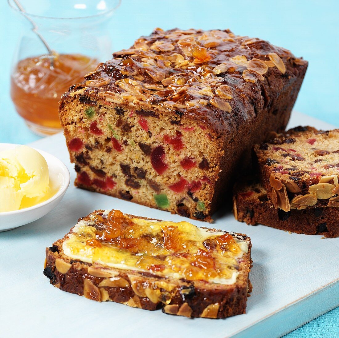 Fruit cake with butter and jam